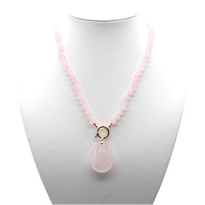 Collier boule en Quartz rose attache bouée en acier doré avec pendentif