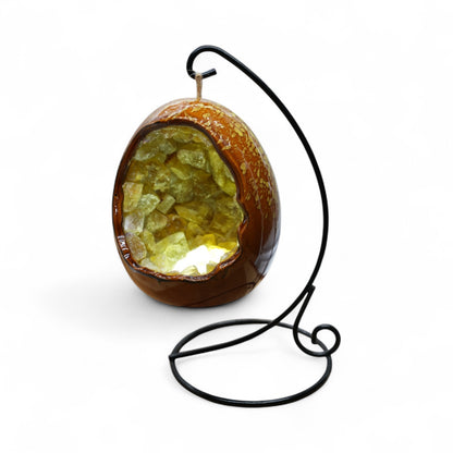 Lampe en oeuf en Fluorine jaune & en céramique avec support noir inclus.