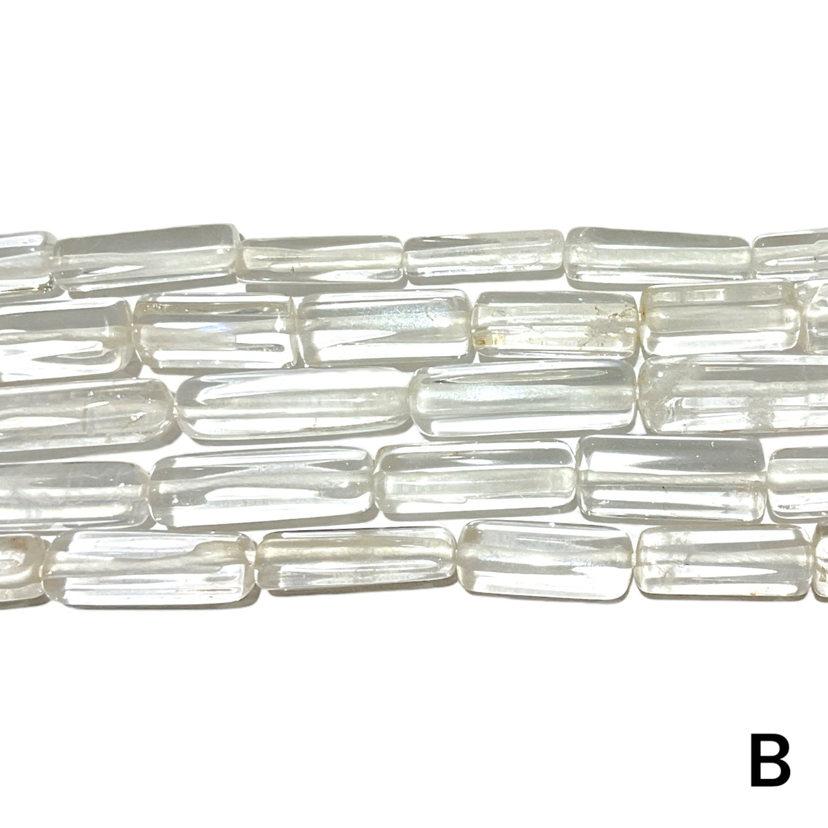 Fil de perles Cristal de roche forme allongé multiple variante A - Foliesbijoux