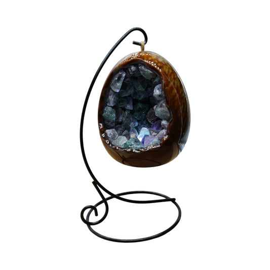 Lampe en oeuf en Fluorine multicolore & en céramique avec support noir inclus.