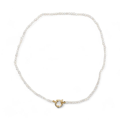 Collier en perles d’eau douce 3.6-4 mm attache bouée en acier doré numero 3