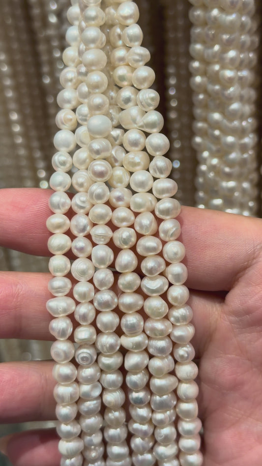 Fil de perle d’eau douce 5-5.5 mm [54]