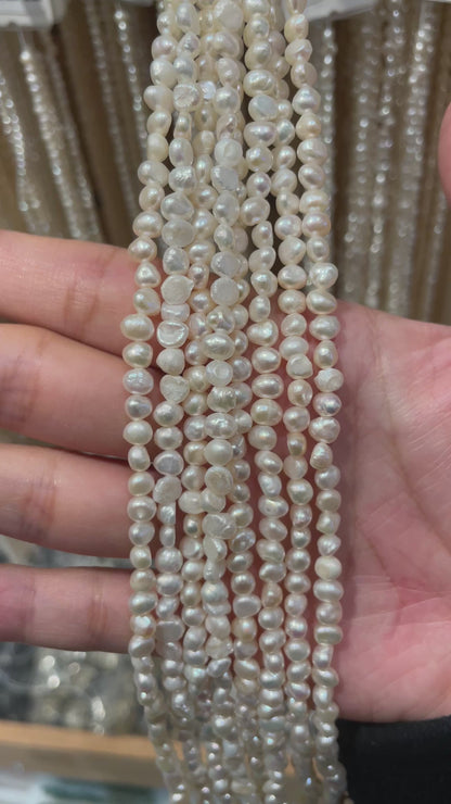 Fil de perle d’eau douce 3-4.5 mm [27]