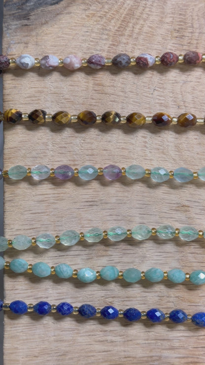 Fil de perles naturelle ovale facetté 6 x 8 mm (21 pierres naturelles)