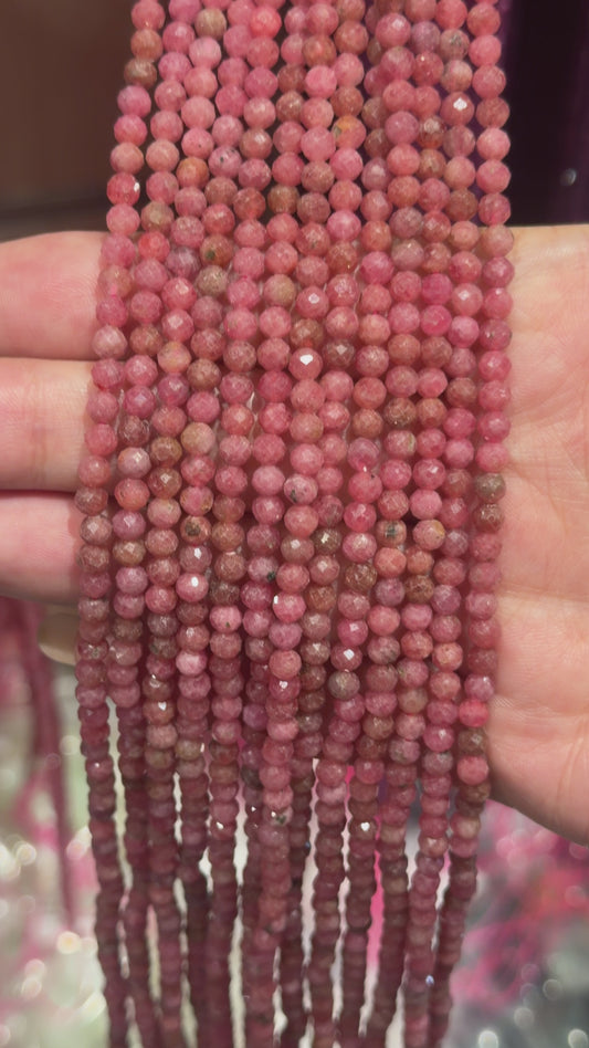 Faceted rhodochrosite pink beaded thread