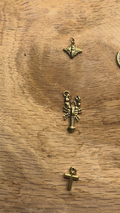 5 Breloques/Pendentifs en acier inoxydable dorée (9 modèles disponible)