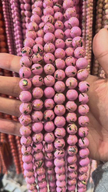 Fil de perle Howlite coquillage rose bonbon chauffé