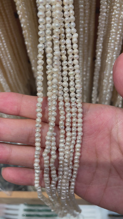 Fil de perle d’eau douce 3-3.5 mm [32]