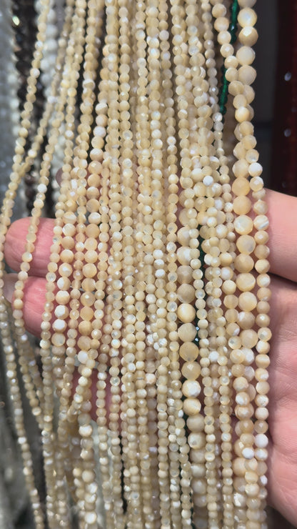 Fil nacre dorée en perle facetté