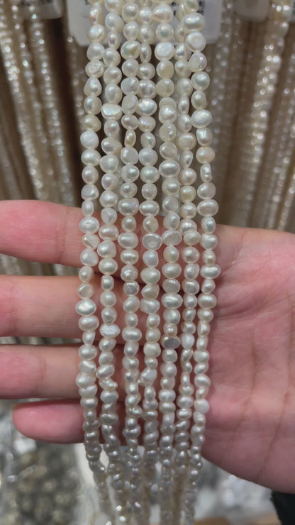 Fil de perle d’eau douce 3-4.5 mm [25]