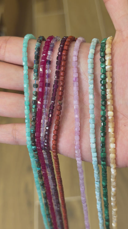 Strand of faceted square beads 2x2 mm (9 stones available)