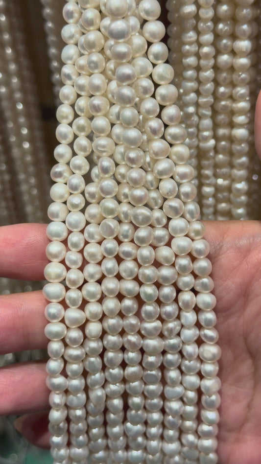 Fil de perle d’eau douce 5-5.5 mm [56]
